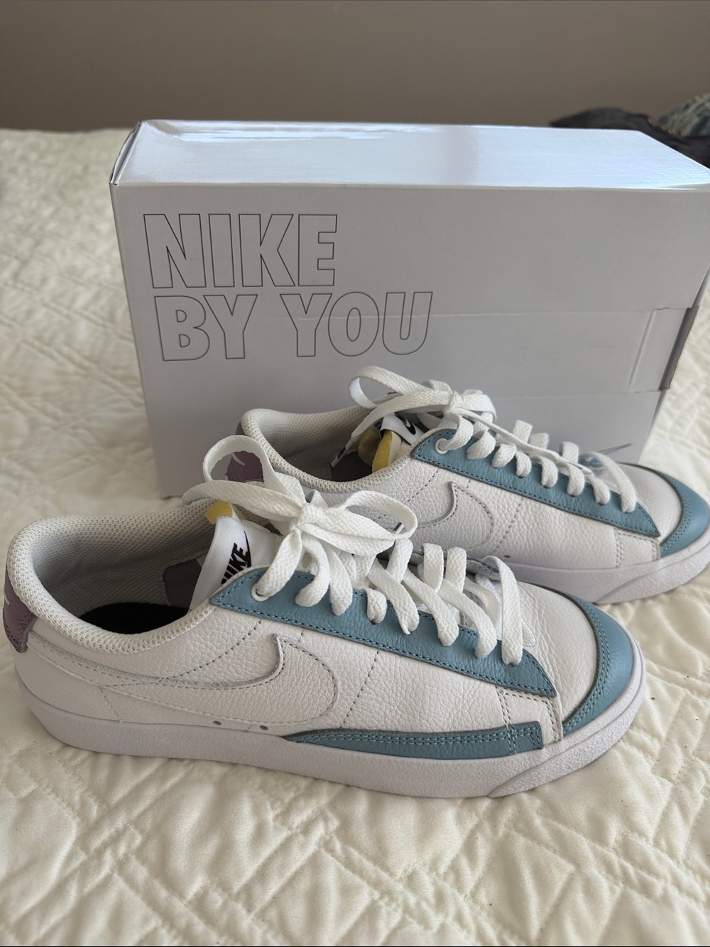 Nike Women's White Sneakers with Light Blue Accents